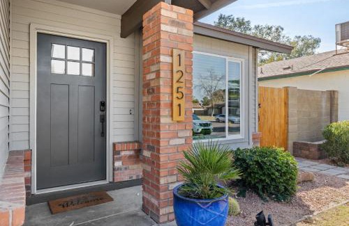 Stoneybrook House | Cottage Evergreen - Outdoor Grille Patio with Putt