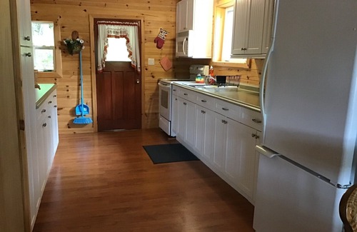 Minden House | Cottage on Horseshoe Lake, Minden, level lot, south facing, sandy beach
