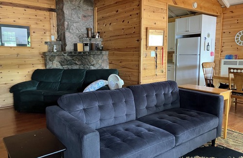 Minden House | Cottage on Horseshoe Lake, Minden, level lot, south facing, sandy beach