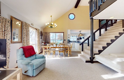 Indian River House | Cottage on the canal to Burt Lake with large patio and space for boat