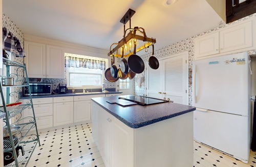 Indian River House | Cottage on the canal to Burt Lake with large patio and space for boat