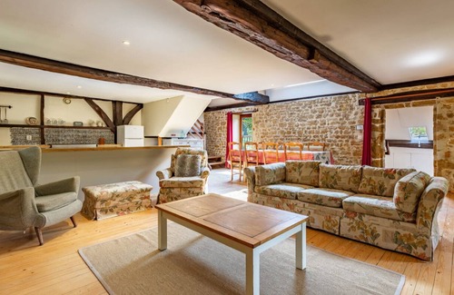 Guerquesalles Cottage | Cottage with shared swimming pool, hot tub, fishing, tennis, UK TV and Wi-Fi