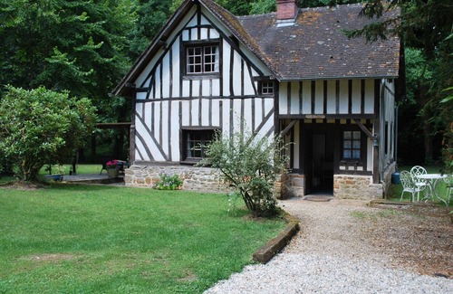 Guerquesalles Cottage | Cottage with shared swimming pool, hot tub, fishing, tennis, UK TV and Wi-Fi