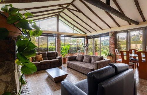 Ubate House | Country house with fireplace and mountain view