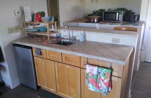 Fort Myers Shores House | Couples Retreat upstairs suite off the Caloosahtchee River with private pool