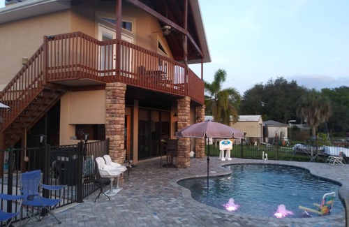 Fort Myers Shores House | Couples Retreat upstairs suite off the Caloosahtchee River with private pool