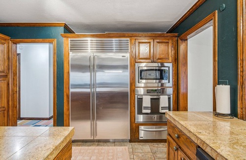 Tulsa House | Cowboy Inspired Fun For A Big Group Just Minutes from Tulsa’s Best Attractions!