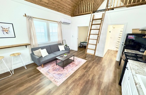 Albertville House | Coyote Tiny Luxury Cabin on Lake with Arcade