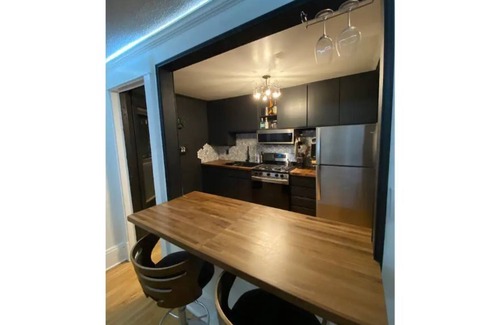 Lowry Hill East Apartment | Cozy 1-bedroom apartment with off-street parking
