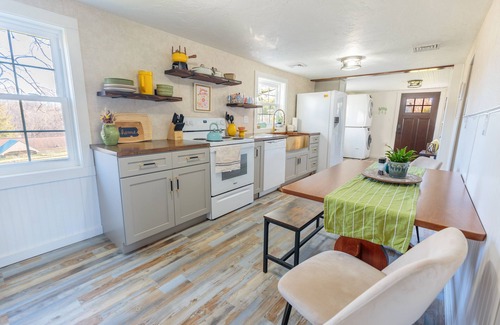 Rossville House | Cozy 1970s Inspired 3 Bedroom Getaway with AC, WiFi, and Outdoor Fire Ring.