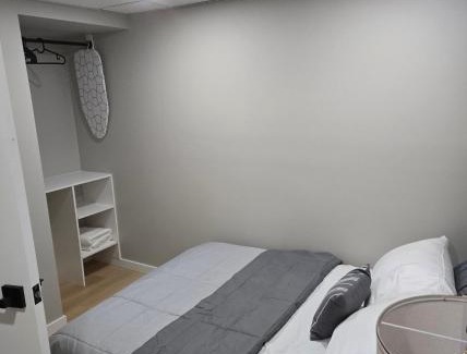 Pinehouse Apartment | Cozy 2 bedroom basement with side entrance