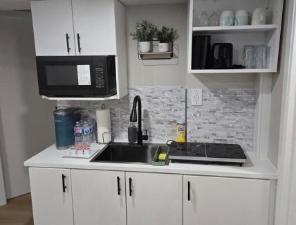 Pinehouse Apartment | Cozy 2 bedroom basement with side entrance