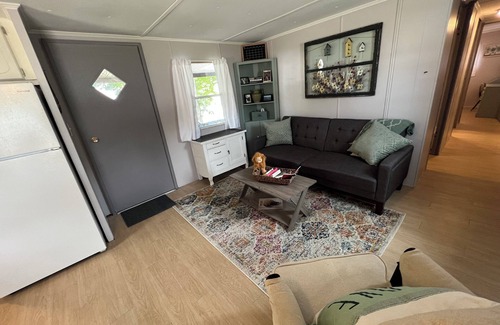 Laketon RV Rental | Cozy 2-bedroom campground in peaceful Claypool with AC, WiFi. Overlooking laken