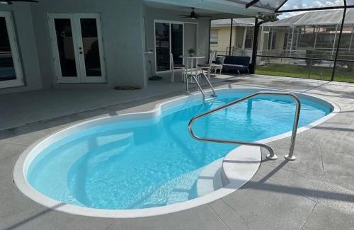 Fort Myers Shores House | Cozy 2 BR Waterfront home with Heated Pool