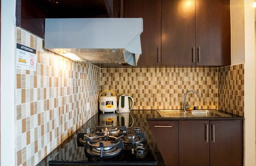 Karet Apartment | Cozy 2BR at Empyreal Epicentrum Apartment By Travelio