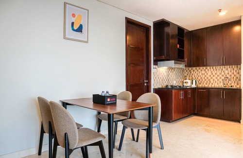 Karet Apartment | Cozy 2BR at Empyreal Epicentrum Apartment By Travelio
