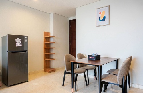 Karet Apartment | Cozy 2BR at Empyreal Epicentrum Apartment By Travelio