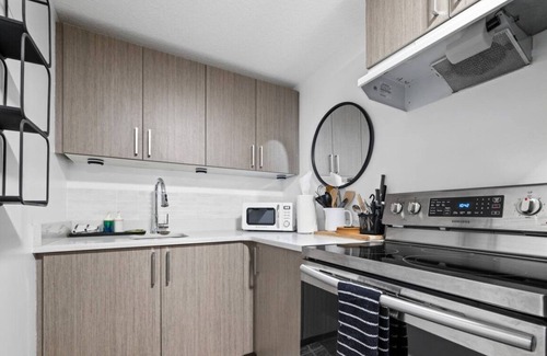 North Central Edmonton Condo | Cozy 2BR Bsmt Suite | Near Commonwealth & Rogers!
