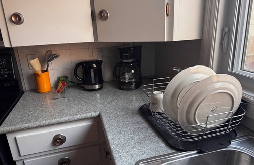 Winnipeg House | Cozy 2BR in Winnipeg. Near airport, food, transport. Your home away from home.