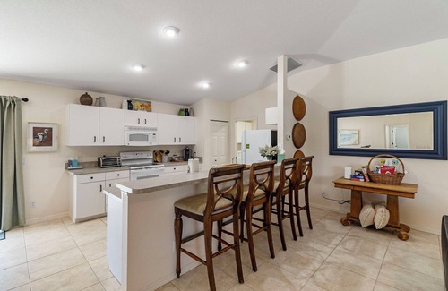 Pebble Beach House | Cozy 3BR, 2BA canal-front home with private pool and serene views. Just 20 minutes from the beach—your perfect Florida escape!