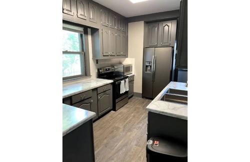 Medical Center House | Cozy 4-bedroom home walking distance to Blackstone