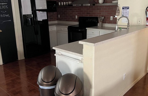 Crystal Gardens House | Cozy 4BR/2BA Smart Home with Relaxing Backyard Oasis in Peaceful Neighborhood