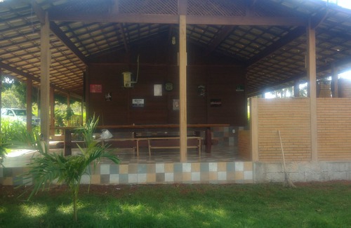 Morada Nova de Minas House | Cozy and Charming Wooden House With Wood Stove and Fishing Pond
