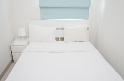 Serpong Apartment | Cozy and Spacious 1BR Apartment at Parkland Avenue By Travelio