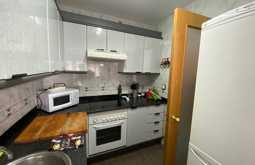 Sant Carles de la Rapita Condo | Cozy apartment with pool, sea views, in the center and 5 minutes from the beach.