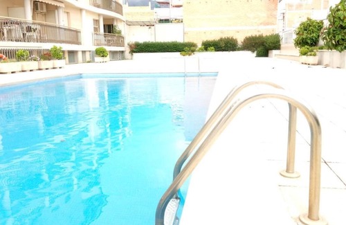 Sant Carles de la Rapita Condo | Cozy apartment with pool, sea views, in the center and 5 minutes from the beach.