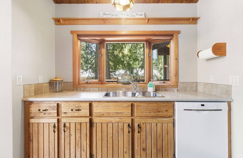 Swansea Point Cabin | Cozy Beach Front getaway, with mountains and lake views all around.