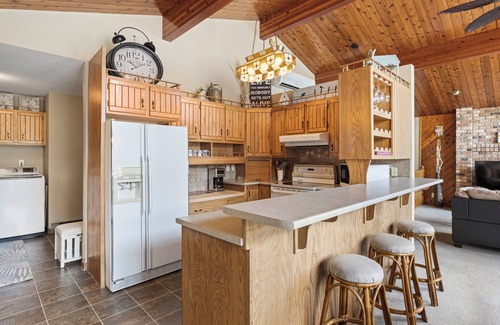Swansea Point Cabin | Cozy Beach Front getaway, with mountains and lake views all around.