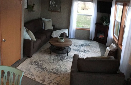 Maple Lake House | Cozy Beach Getaway with Private Sandy Beach & Dock, 2 Paddle Boards, & 2 Kayaks