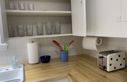 Cheyenne House | Cozy Brick Cottage in Established Centrally located Neighborhood