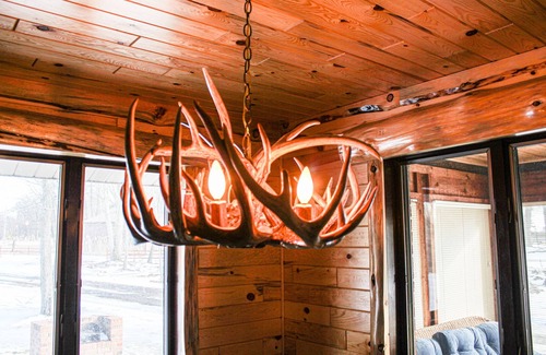 Au Gres Cabin | Cozy Cabin in the Woods- close access, private road to dock & Lake Huron access.