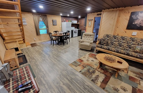 Inlet Cabin | COZY CABIN NEAR A CREEK IN THE FOREST