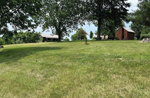 Maysville Cabin | Cozy Cabin, nestled on a 200 acre Horse Farm - family and pet friendly.