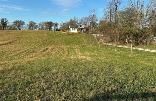 Hardyville Cabin | Cozy cabin with loft in midst of farmland WiFi, AC, washer-dryer