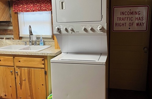 Kalkaska Cabin | Cozy cabin with wood burning fireplace. Ride in/out the snowmobile/ORV trails