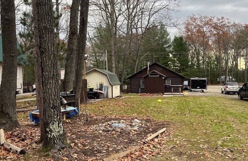 Kalkaska Cabin | Cozy cabin with wood burning fireplace. Ride in/out the snowmobile/ORV trails