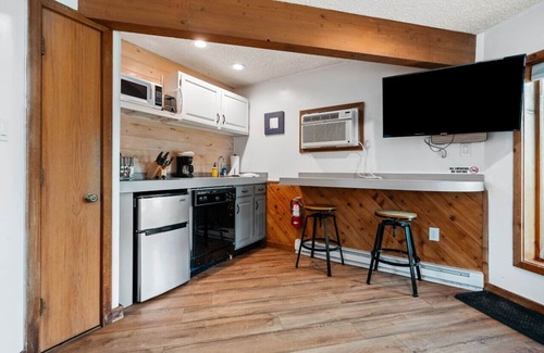 Mancelona Condo | Cozy condo- walk to the ski lift and Ivan's!