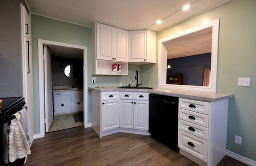 Port Burwell House | Cozy Corner Retreat - Pool, Sunroom, 0.7 Acres, 5 Minutes to the Beach