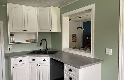 Port Burwell House | Cozy Corner Retreat - Pool, Sunroom, 0.7 Acres, 5 Minutes to the Beach