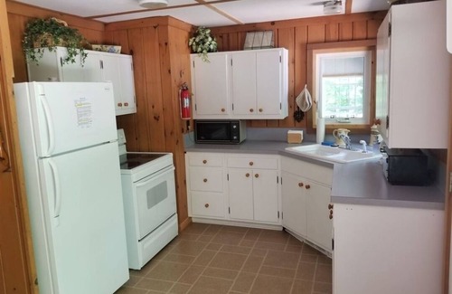 Charlevoix Cottage | Cozy Cottage on a Private Wooded Lot, Steps From Lake Charlevoix Waterfront!