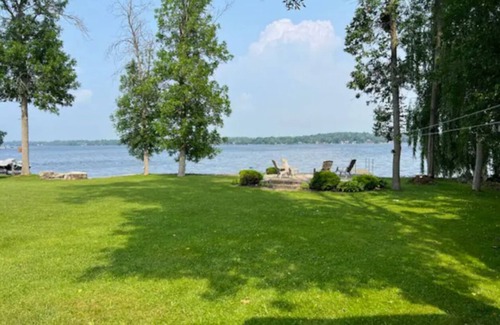 Ennismore House | Cozy Cottage remodelled with great private yard beach and dock! 3 Beds 1 Bath