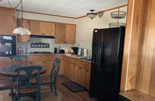 West Branch House | Cozy cottage with beautiful view of Grass Lake & walking distance to Clear Lake