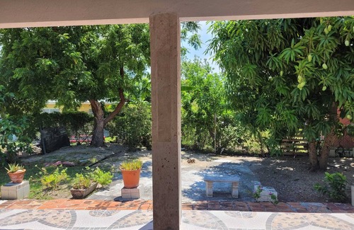 Bahamas Terrace House | Cozy family home 10 minutes walk to the beach. Keyless entry. Security cameras.