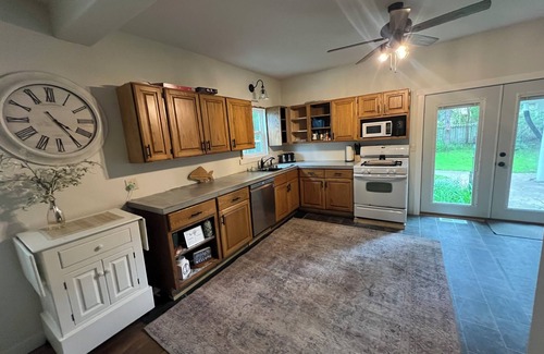 Spirit Lake House | Cozy four bedroom home, private fenced backyard, minutes from East Okoboji.