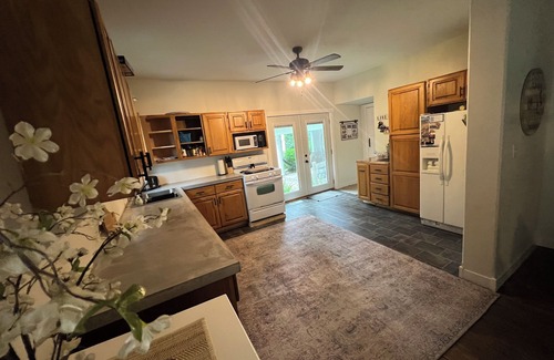 Spirit Lake House | Cozy four bedroom home, private fenced backyard, minutes from East Okoboji.