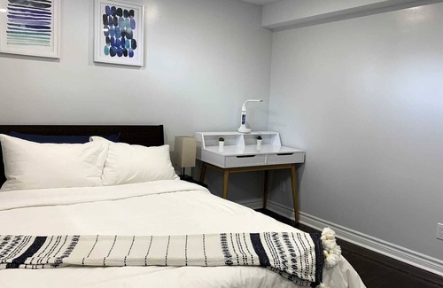 Hamilton House | Cozy, fully equipped open space basement.